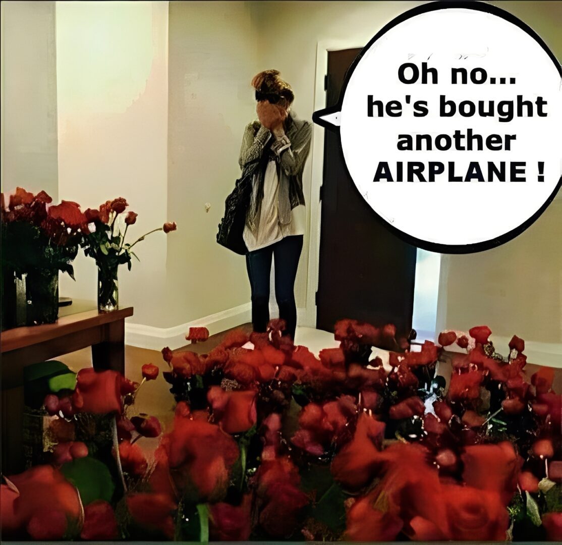 Woman surprised by room full of roses