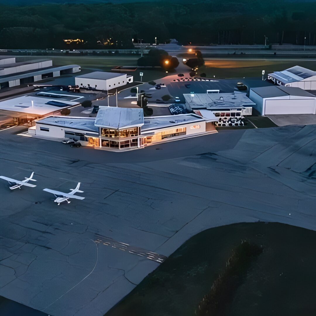 Airport terminal and hangars at dusk